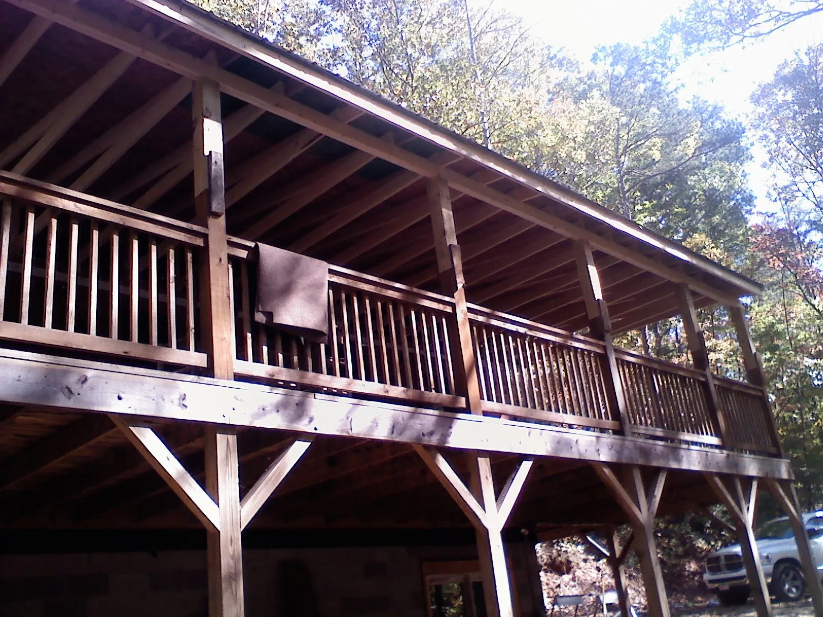 Timber framing under a new elevated porch and deck — Roof Leak Repair in Dickinson by Roofing Brothers